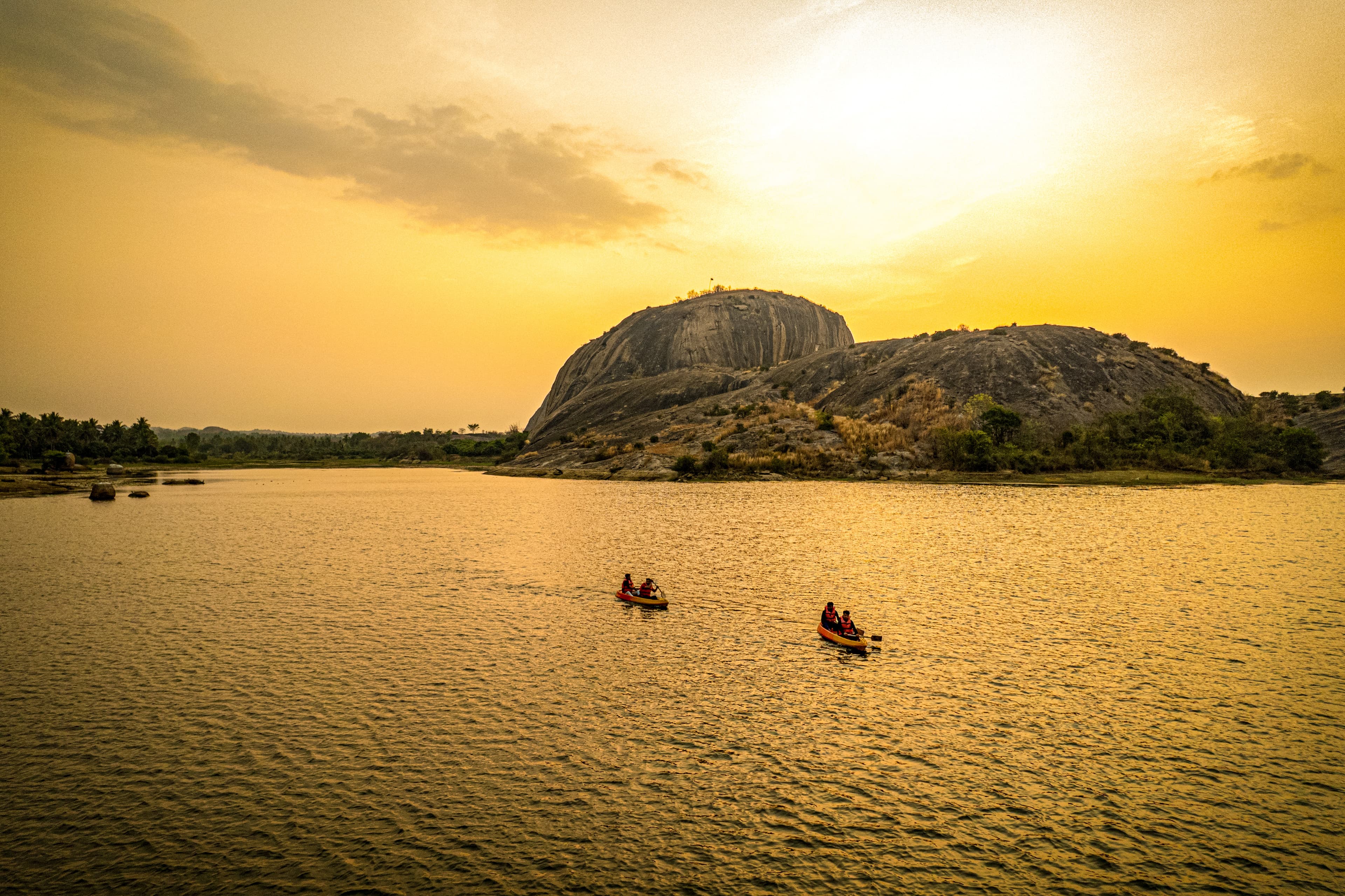 Kayaks at the lakeside at sunset