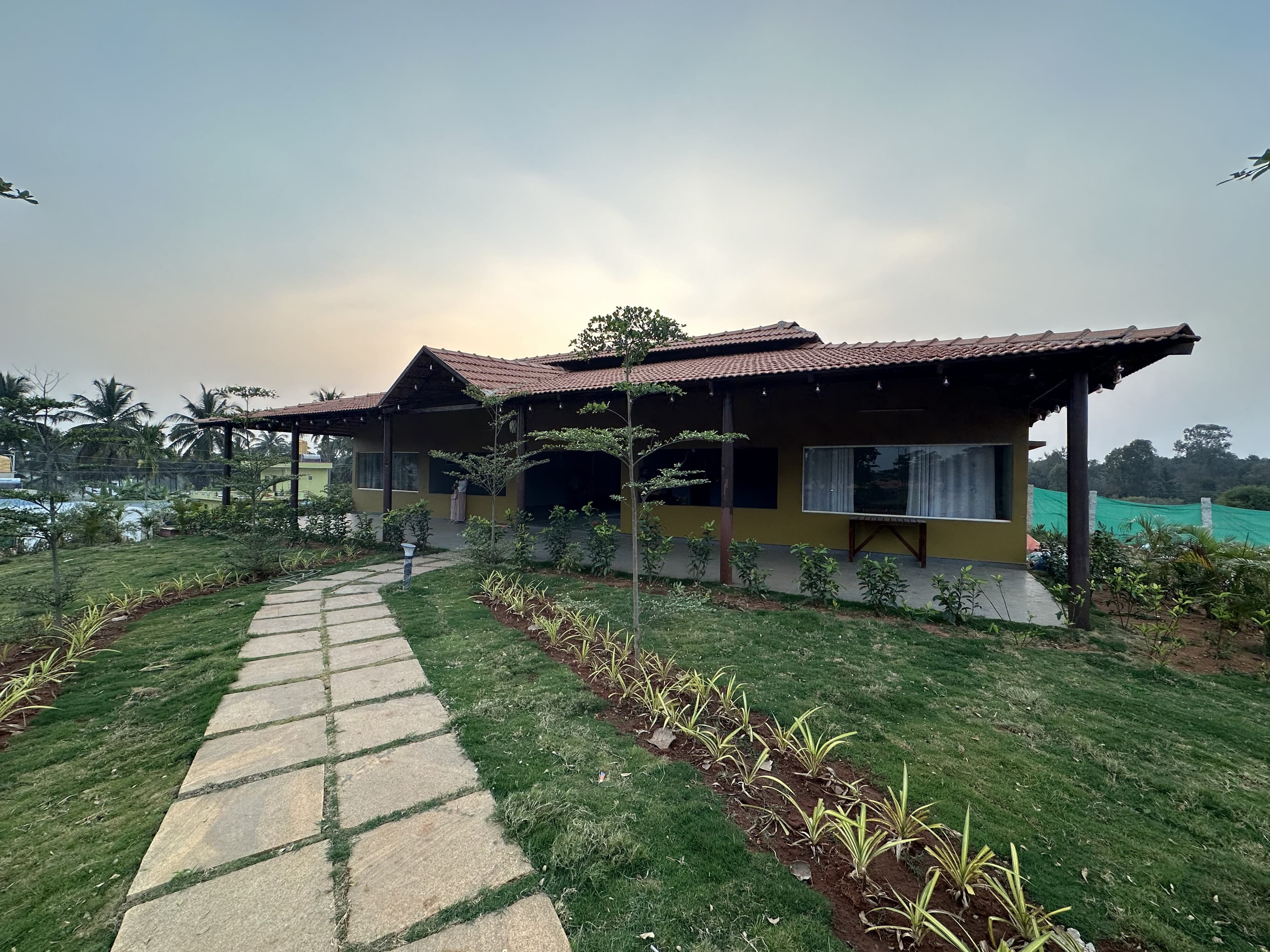 Building, path and lawn at Q Nandi Retreat